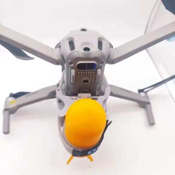 Contrôle universel du lanceur de libérateur de drone par lumière
